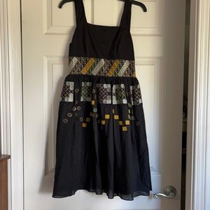 Hand-made summer dress with embodied pattern